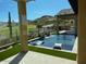 Luxury backyard oasis featuring a sparkling pool and spa at 9633 E Quarter Circle Loop, Gold Canyon, AZ 85118