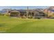 Luxury home with stucco exterior, tile roof, and stunning mountain views at 9633 E Quarter Circle Loop, Gold Canyon, AZ 85118
