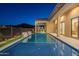 Inviting rectangular pool, surrounded by a large patio and beautiful landscaping at 9633 E Quarter Circle Loop, Gold Canyon, AZ 85118