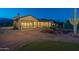 Back of house with pool and desert landscaping at 9633 E Quarter Circle Loop, Gold Canyon, AZ 85118