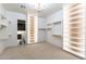 Spacious walk-in closet with custom shelving and lighting at 9633 E Quarter Circle Loop, Gold Canyon, AZ 85118
