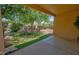 Covered patio with seating area overlooking the backyard at 556 W Mirage Loop, Casa Grande, AZ 85122