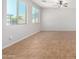 Spacious living room with tile flooring and large windows at 4506 W Maggie Dr, San Tan Valley, AZ 85144