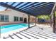 Inviting backyard pool with pergola and patio at 4506 W Maggie Dr, San Tan Valley, AZ 85144