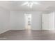 Bedroom with wood-look floors and access to a walk-in closet at 4506 W Maggie Dr, San Tan Valley, AZ 85144