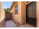 Back exterior view showing gated entry and door at 4506 W Maggie Dr, San Tan Valley, AZ 85144