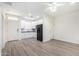 Modern kitchen with white cabinets and vinyl flooring at 4506 W Maggie Dr, San Tan Valley, AZ 85144