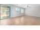 Living room with sliding glass door to backyard at 4506 W Maggie Dr, San Tan Valley, AZ 85144
