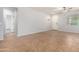 Spacious living room with tile floors and ceiling fan at 4506 W Maggie Dr, San Tan Valley, AZ 85144