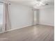 Large bedroom with neutral walls and wood-look floors at 4506 W Maggie Dr, San Tan Valley, AZ 85144
