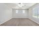 Bright bedroom with wood-look floors and ceiling fan at 4506 W Maggie Dr, San Tan Valley, AZ 85144