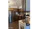 Kitchen features dark wood cabinets, stainless steel appliances, and tile backsplash at 2460 E Main St # G3, Mesa, AZ 85213
