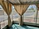 Covered patio with curtains and view of the street at 2460 E Main St # G3, Mesa, AZ 85213