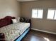 Bedroom featuring a daybed and decorative pillows at 2460 E Main St # G3, Mesa, AZ 85213