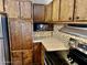 Kitchen features wood cabinets and a microwave at 2460 E Main St # G3, Mesa, AZ 85213