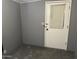 Bright bedroom with window and door at 2460 E Main St # G3, Mesa, AZ 85213