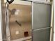Shower stall with tiled walls and a handheld shower head at 2460 E Main St # G3, Mesa, AZ 85213