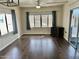 Spacious living room with wood flooring and a fireplace at 2460 E Main St # G3, Mesa, AZ 85213