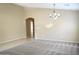 Bright dining room with neutral walls and carpet flooring at 21978 N Dietz Dr, Maricopa, AZ 85138