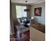 Bright dining area with table and chairs, hardwood floors at 7009 E Acoma Dr # 2037, Scottsdale, AZ 85254