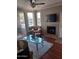Living room with hardwood floors, fireplace, and plenty of natural light at 7009 E Acoma Dr # 2037, Scottsdale, AZ 85254