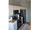Updated kitchen with granite countertops and white cabinets at 7009 E Acoma Dr # 2037, Scottsdale, AZ 85254