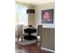 Cozy dining area with a table for four and large artwork at 7009 E Acoma Dr # 2037, Scottsdale, AZ 85254