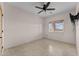 Spacious bedroom with tile flooring and ceiling fan at 37408 N 240Th Dr, Morristown, AZ 85342