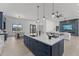 Spacious kitchen with a large island, modern appliances, and breakfast bar at 39220 N 30Th Dr, Phoenix, AZ 85086