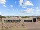 Modern home with three-car garage, desert landscaping, and mountain views at 39220 N 30Th Dr, Phoenix, AZ 85086