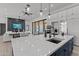 Modern kitchen with large island, stainless steel appliances, and white cabinetry at 39220 N 30Th Dr, Phoenix, AZ 85086