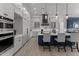 Modern kitchen with a large island and stainless steel appliances at 39220 N 30Th Dr, Phoenix, AZ 85086