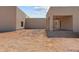 Landscaped backyard with patio and sand at 39220 N 30Th Dr, Phoenix, AZ 85086