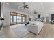 Spacious living room with sliding glass doors leading to backyard and modern fireplace at 39220 N 30Th Dr, Phoenix, AZ 85086