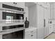 Modern kitchen with stainless steel appliances and white cabinets at 39220 N 30Th Dr, Phoenix, AZ 85086