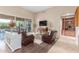 Spacious living room with hardwood floors and built-in shelving at 8919 E Calle Del Palo Verde --, Scottsdale, AZ 85255