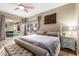 Elegant bedroom with hardwood floors and backyard access at 8919 E Calle Del Palo Verde --, Scottsdale, AZ 85255