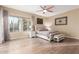 Spacious bedroom with hardwood floors and large windows at 8919 E Calle Del Palo Verde --, Scottsdale, AZ 85255