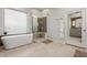 Luxurious bathroom with soaking tub and glass shower at 8919 E Calle Del Palo Verde --, Scottsdale, AZ 85255