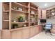Home office with built-in shelving at 8919 E Calle Del Palo Verde --, Scottsdale, AZ 85255