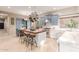 Gourmet kitchen with blue cabinets, an island, and pot rack at 8919 E Calle Del Palo Verde --, Scottsdale, AZ 85255