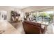 Open living room with hardwood floors and access to backyard at 8919 E Calle Del Palo Verde --, Scottsdale, AZ 85255