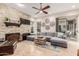 Relaxing living room, stone fireplace and access to a patio at 8919 E Calle Del Palo Verde --, Scottsdale, AZ 85255