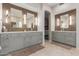 Double vanity bathroom with modern fixtures and elegant tile at 8919 E Calle Del Palo Verde --, Scottsdale, AZ 85255