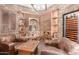 Impressive wine cellar with stone walls and wooden racks at 8919 E Calle Del Palo Verde --, Scottsdale, AZ 85255