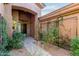 Inviting entryway with lush landscaping and stone pathway at 8919 E Calle Del Palo Verde --, Scottsdale, AZ 85255