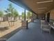 Relaxing covered patio with comfortable seating at 312 E O'Neil Dr # 128, Casa Grande, AZ 85122