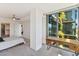 Bright bedroom with large windows, a desk, and a comfortable bed at 7180 E Kierland Blvd # 509, Scottsdale, AZ 85254