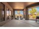 Relaxing covered patio with lounge chairs at 16738 E Lone Mountain Rd, Scottsdale, AZ 85262