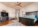 Spacious Primary bedroom with large bed, TV, and plenty of natural light at 16738 E Lone Mountain Rd, Scottsdale, AZ 85262